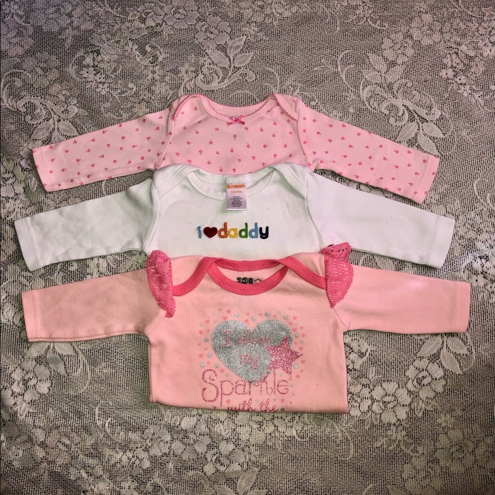 Bundle of babygirl long sleeve onesies (0-6 months).